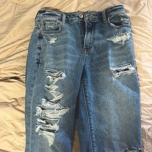 Ripped jeans in a medium blue color